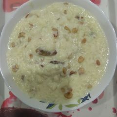 A picture of Rice kheer Or chaler payesh.