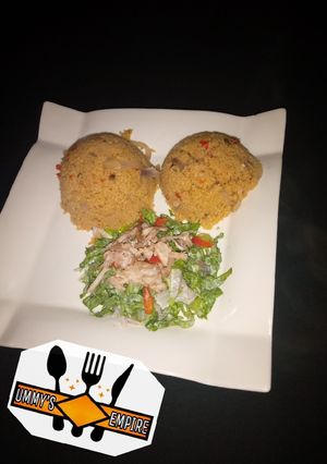 A picture of Jollof couscous wif salad.