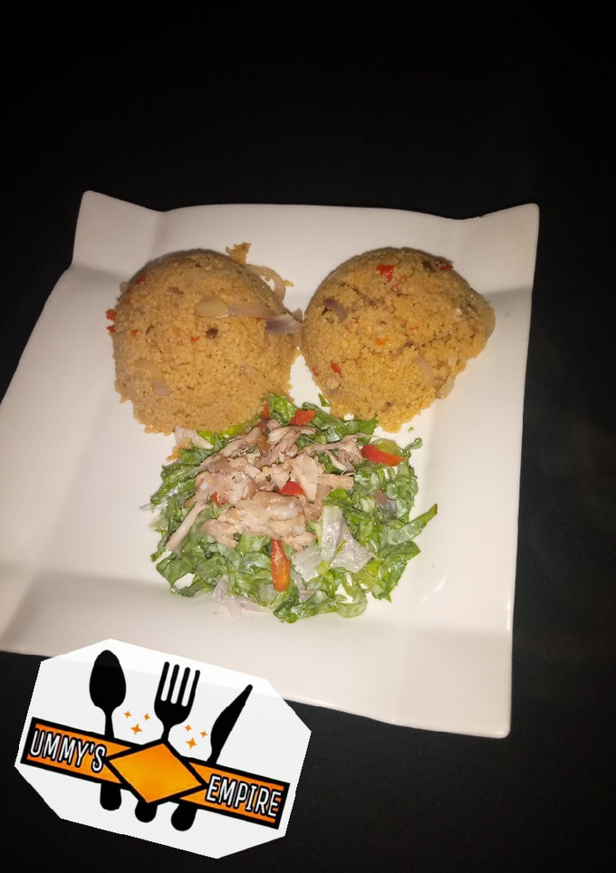 A picture of Jollof couscous wif salad.