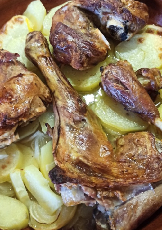 Una foto de Lechal asado al azafrán