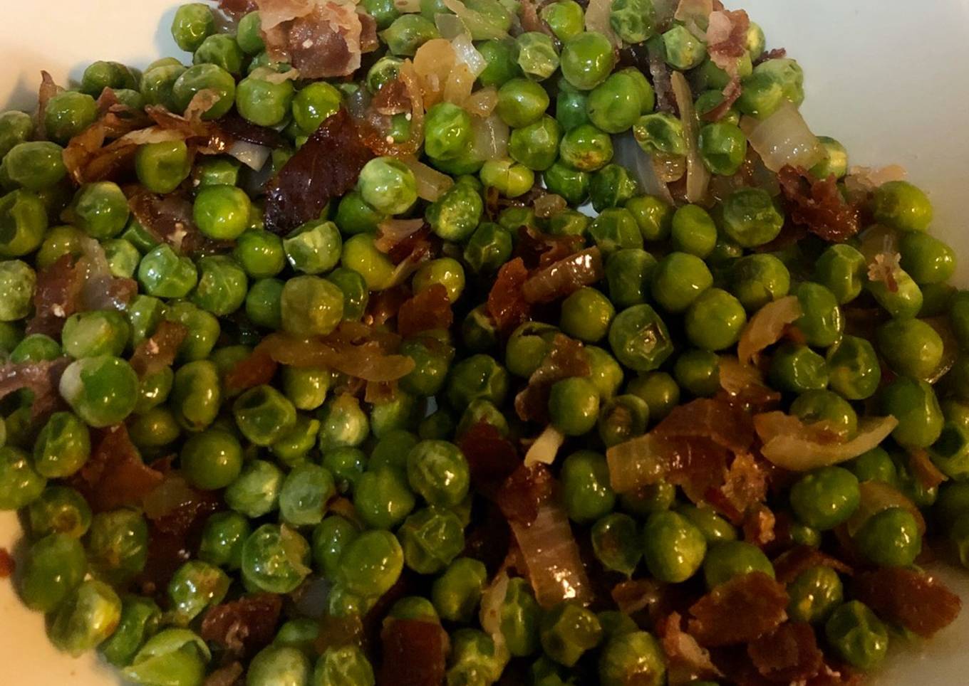 Guisantes salteados con jamón ibérico