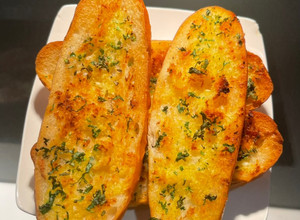 Hình của món Bánh mì nướng bơ tỏi NCKD.