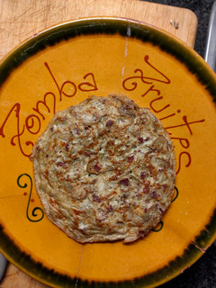 Una foto de Tortilla de alcachofas con jamón