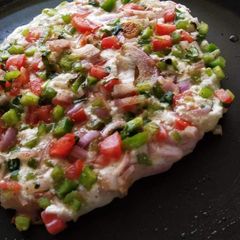 A picture of Poha suji uttapam.