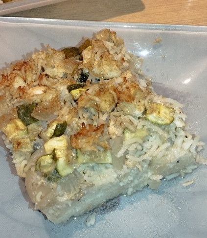 Une photo de Gratin de poulet, riz et courgette