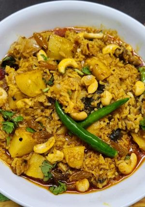 A picture of Muri Ghonto : Fish Head curry with Gobindobhog Rice.