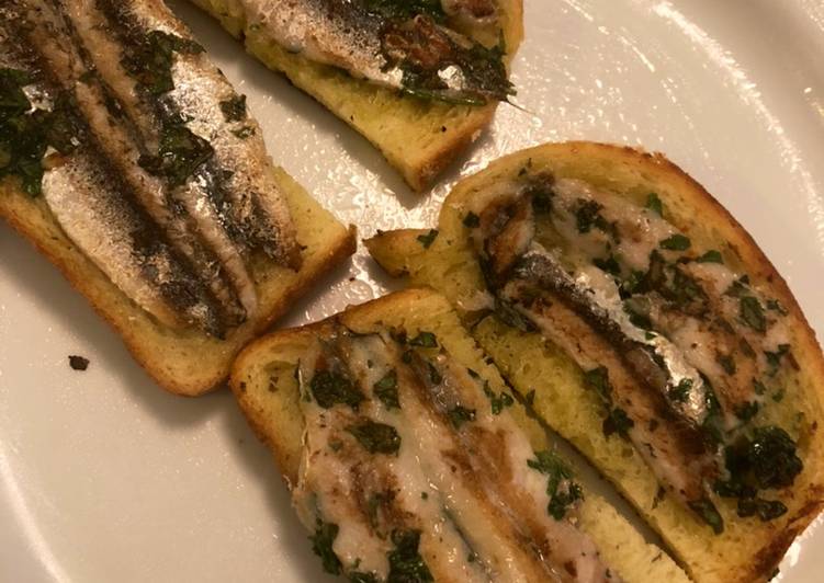Step-by-Step Guide to Prepare Premiato Bruschette di alici marinate con le erbe aromatiche
