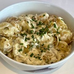 German Kartoffelsalat (German potato salad) A picture of German Kartoffelsalat (German potato salad).