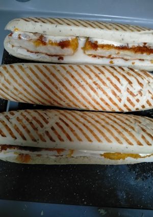 A picture of Breaded Chicken, Goat Cheese, and Mozzarella Panini.