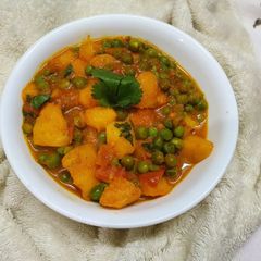 A picture of Potato Peas Curry or Aloo Matar.