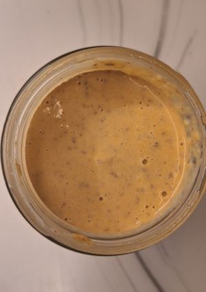 A picture of Sweet potato mashed with peanut butter and cheese.