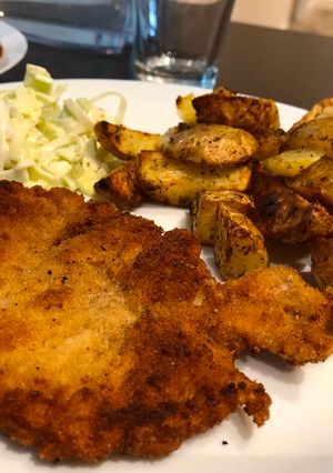 A picture of Chicken breasts in breadcrumbs.