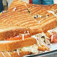 A picture of Grilled three layer sandwich.