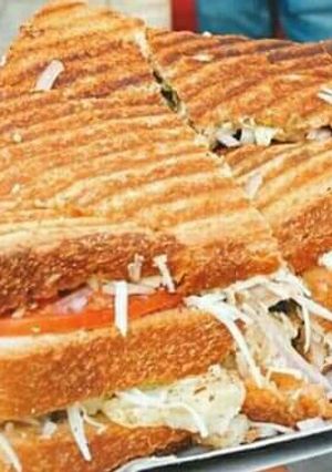 A picture of Grilled three layer sandwich.