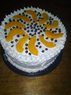 Una foto de Torta postre duraznos