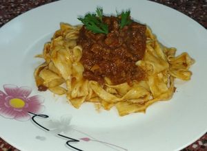 Una foto de Tagliatelles a la bolognesa