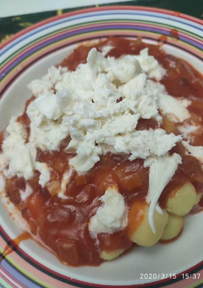 Una foto de Gnocchis con salsa y mozzarella