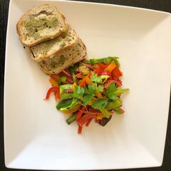 A picture of Stir fry green veggies & bread.