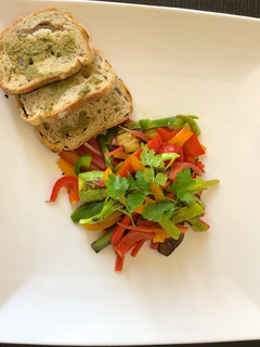 A picture of Stir fry green veggies & bread.