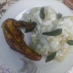 A picture of Muhogo wa nazi with baked chicken tikka #my coconut dish contest.