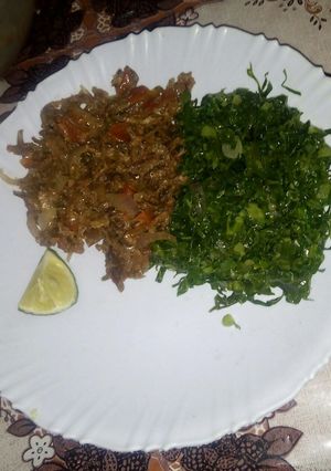 A picture of Fried omena with greens.