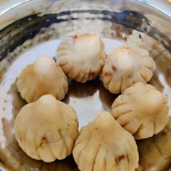 A picture of Coconut and Jaggery wheat Modak.