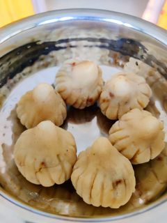 A picture of Coconut and Jaggery wheat Modak.