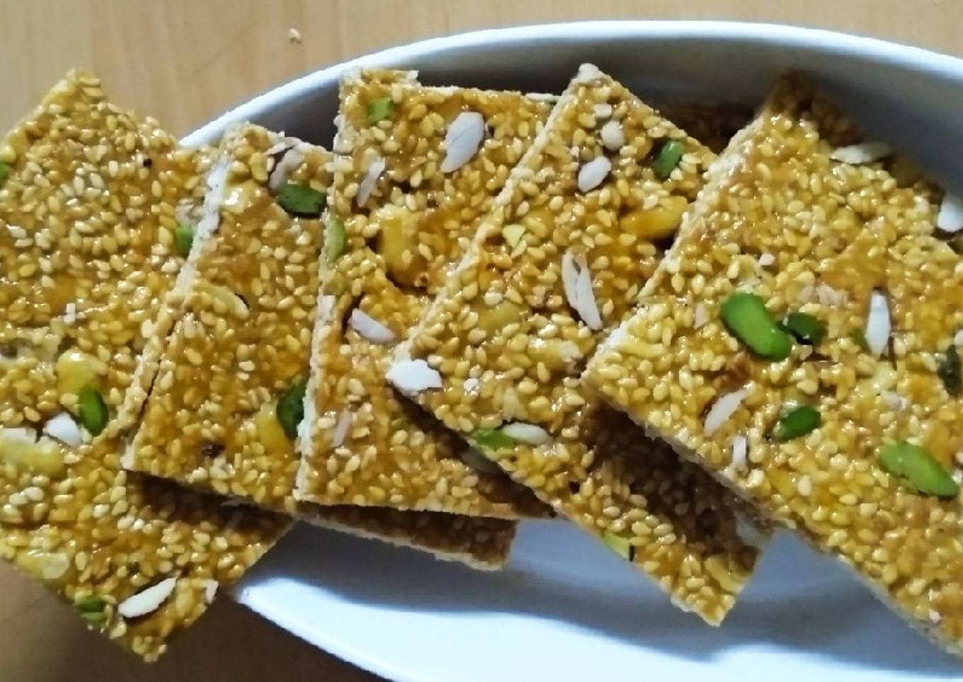 Seasme peanut gud pista chikki.