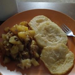 A picture of Fried Potatoes and Zucchini.