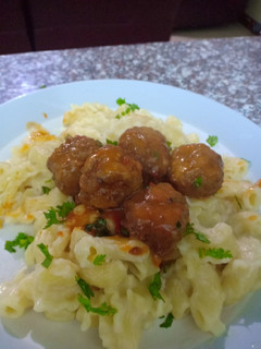 A picture of Pasta in white sauce.