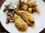 Una foto de pollo a la mostaza con champiñones
