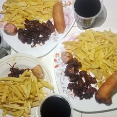 A picture of Homemade chips,corndogs and friedmeat.