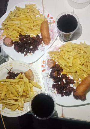 A picture of Homemade chips,corndogs and friedmeat.