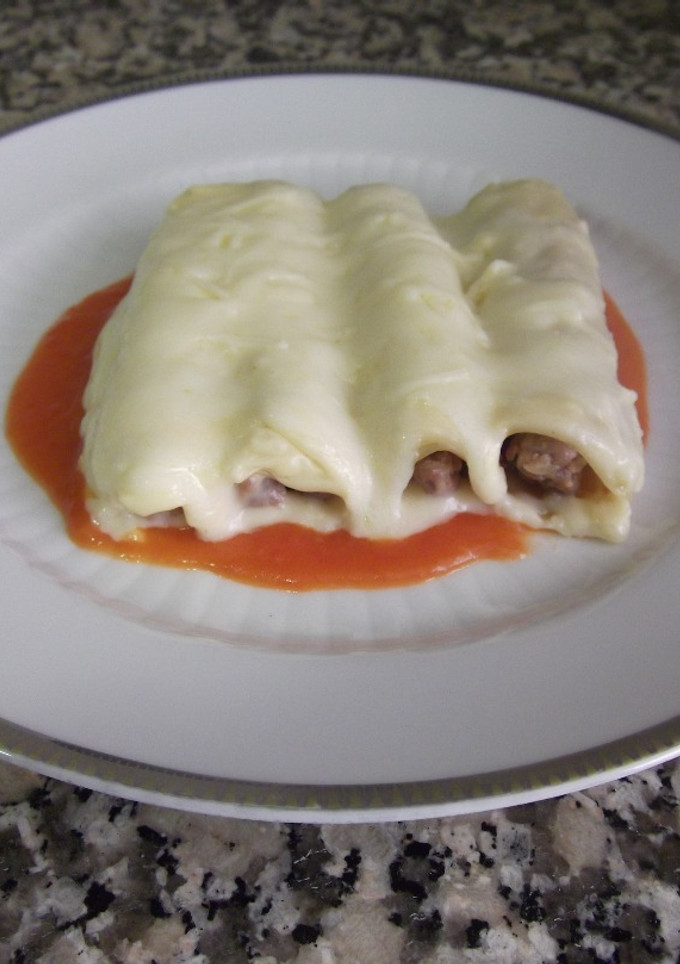 Una foto de Canelones rellenos de carne picada y paté