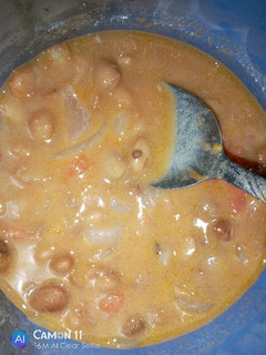 A picture of Coconut beans with chapatis.