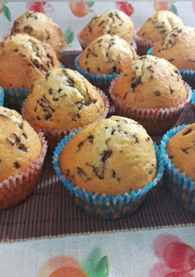 Una foto de Magdalenas de naranja y chocolate
