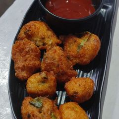 A picture of #RSC#Urad dal rice powder,jeera black pepper bonda.