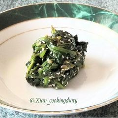 A picture of Sigeumchi Namul 시금치 나물(Korean Spinach Side dish).