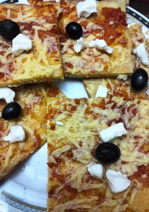 صورة لوصفة بيتزا كاري بالسميد 🍕