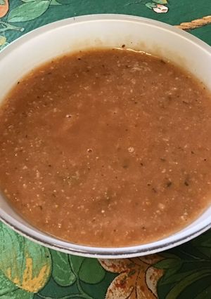 Une photo de Marinade épicée au jus de raisin blanc, coriandre, tomate et gingembre