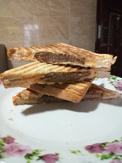 A picture of Cheesy beef sandwich.