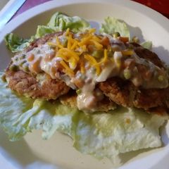 A picture of Creamed Tuna over Southwestern Potato Cakes.