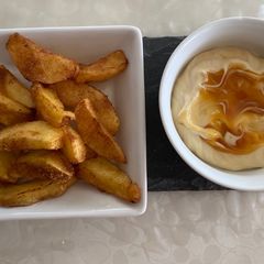 A picture of Apple fries with caramel.