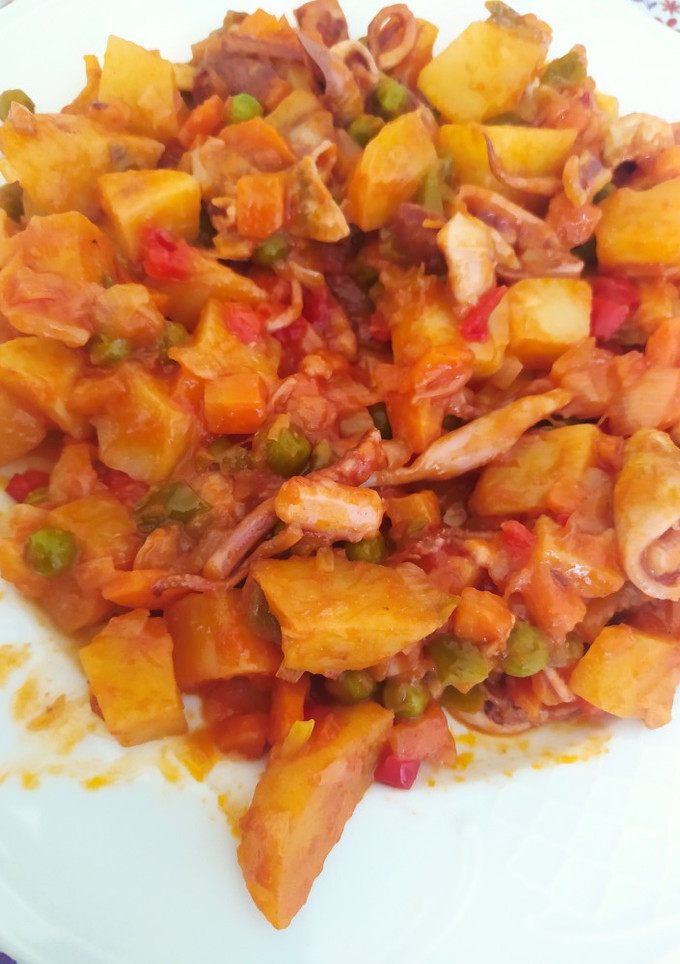 Una foto de Potas con verduras y patatas