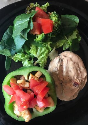 A picture of Luxury Peppers with Salad and Chipotle Dip.