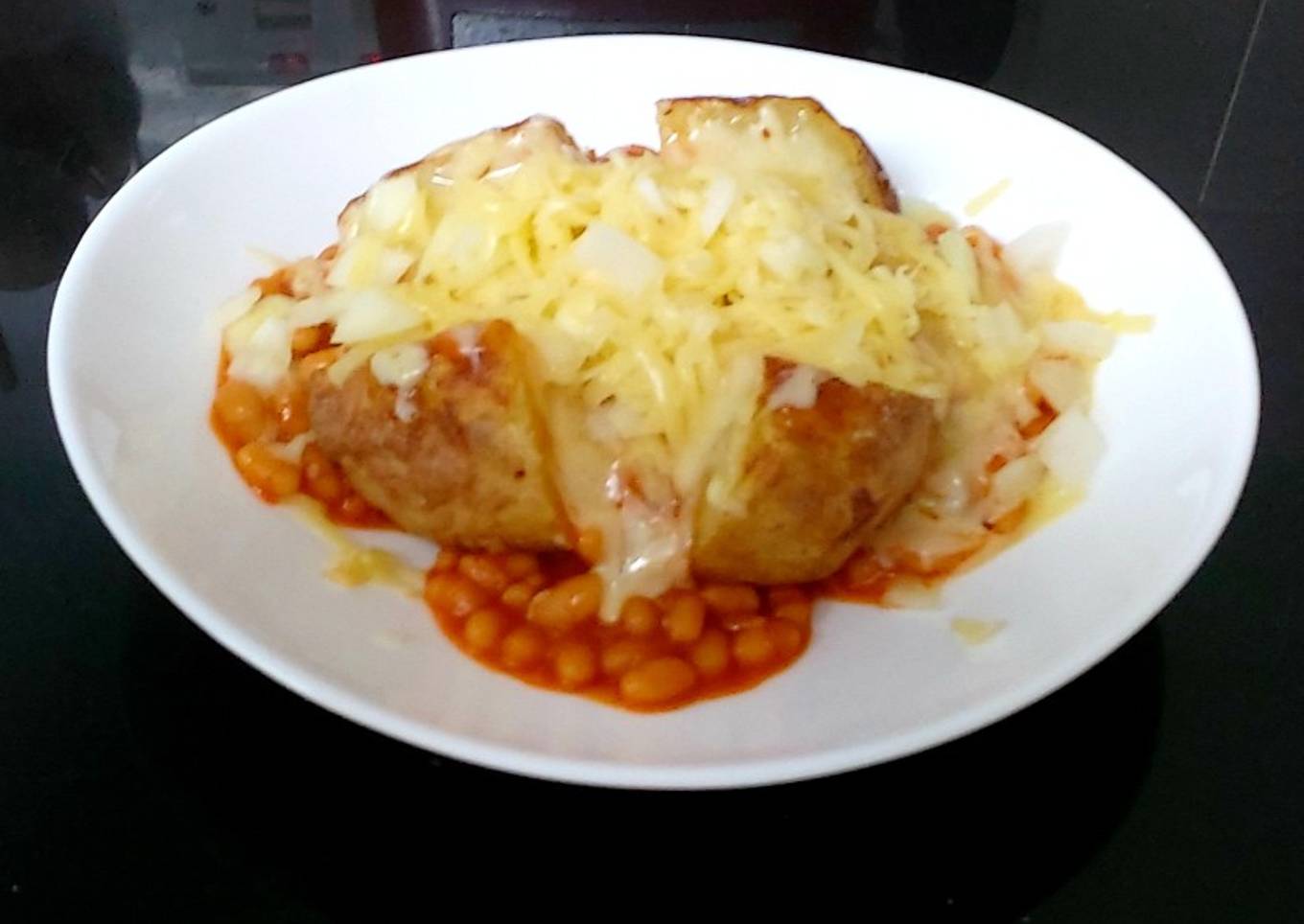 My Jacket Potato stuffed with Beans and Grated Cheese and Onionâ¤