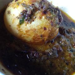 Sorse dim(egg in mustard gravy) A picture of Sorse dim(egg in mustard gravy).