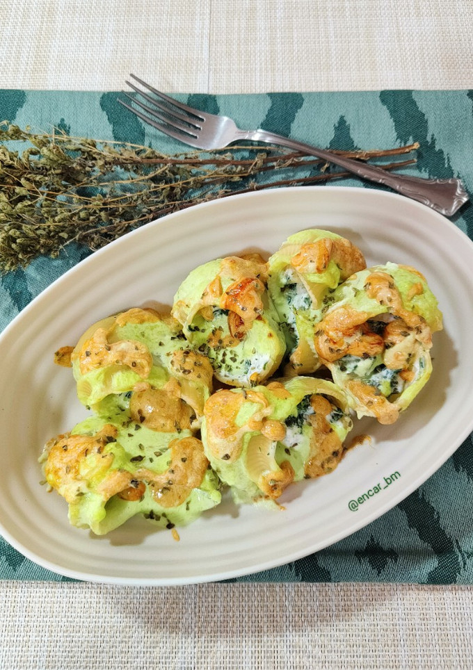 Una foto de Lumacomis rellenos de espinacas y ricotta