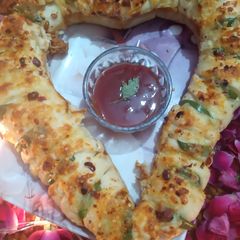 A picture of Cheesy chicken bread.
