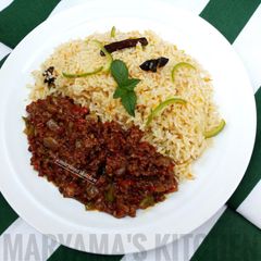 A picture of Nigerian carrot fried rice with minced meat soup.